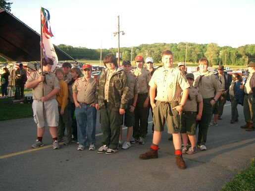 Troop 106 lining up in uniform at a camporee